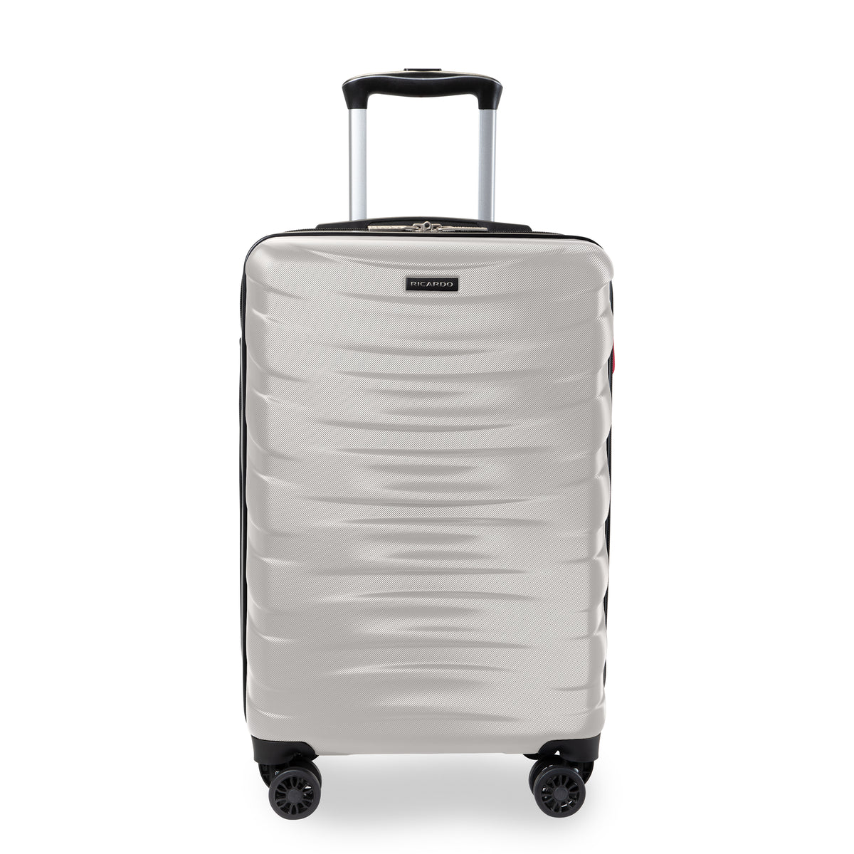 A silver spinner suitcase with a textured wavy pattern, featuring an extended telescopic handle and four multi-directional wheels, shown against a plain white background.