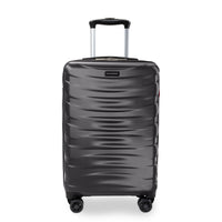 A dark gray herringbone-patterned spinner suitcase with an extended telescopic handle, shown on a clean white background.