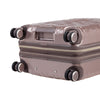 close up of  wheels on metallic topaz rolling carry-on