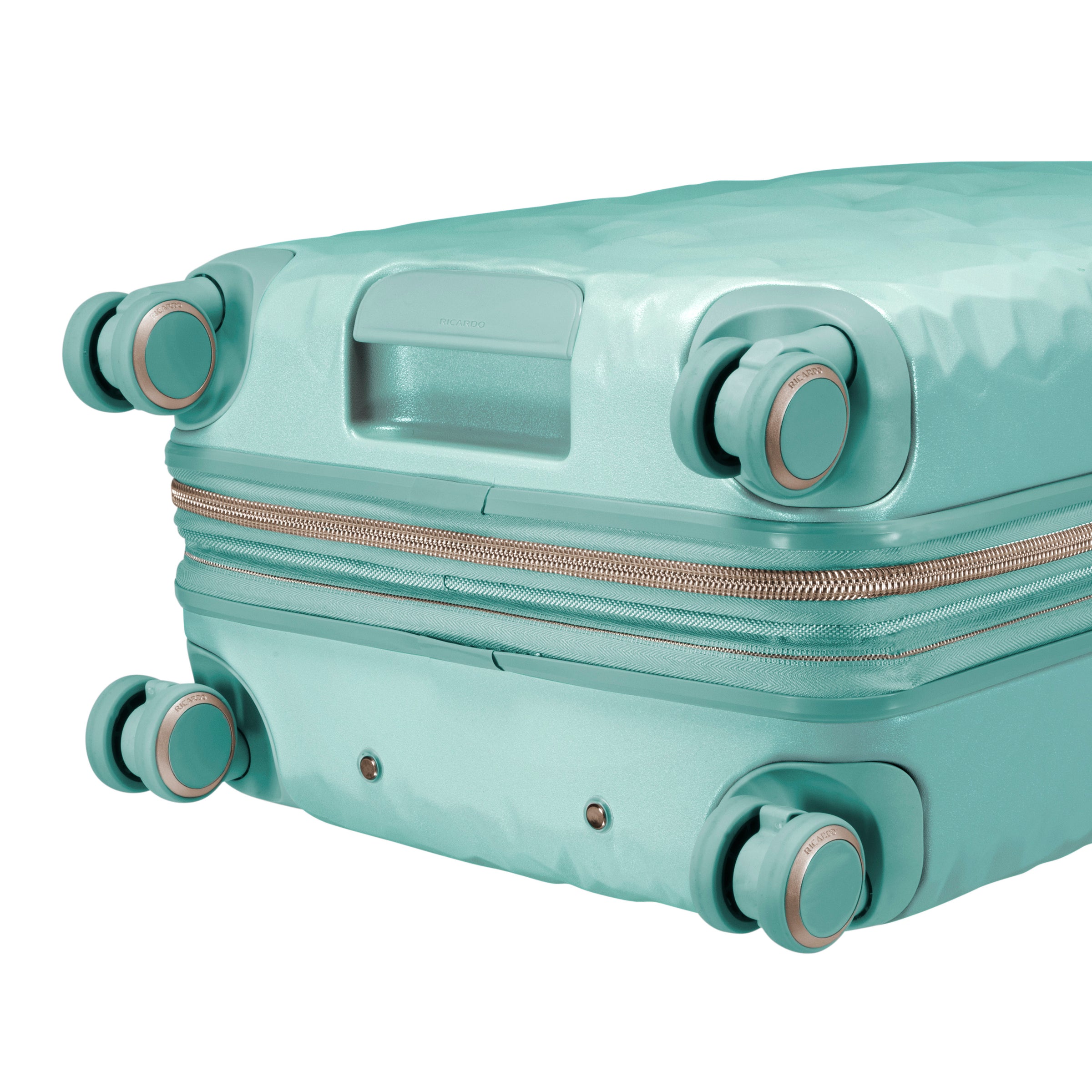 close up of wheels on mint green rolling carry-on