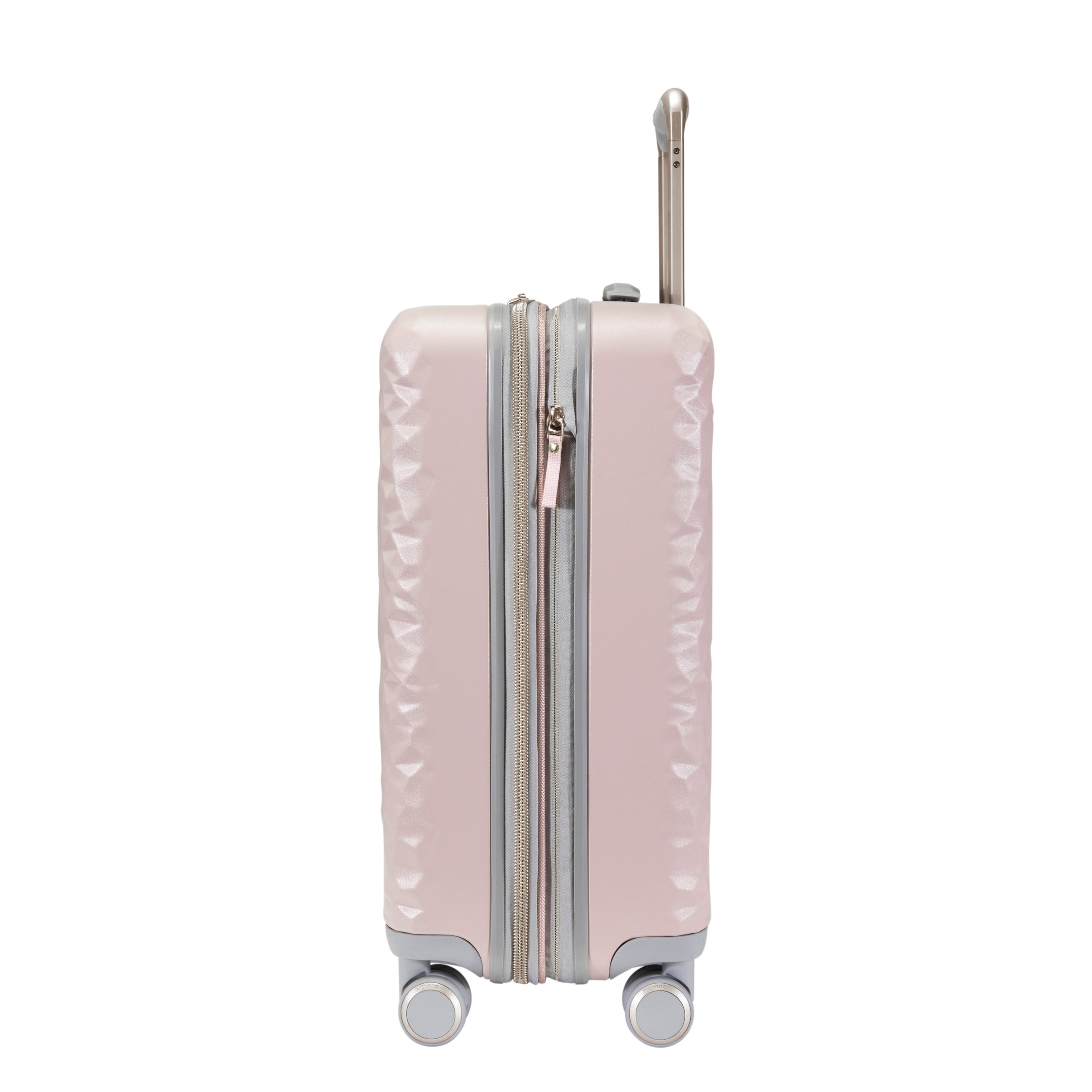 side view of blush pink carry on suitcase with grey and metallic accents 