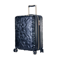 navy blue hardside suitcase with a textured surface and metallic accents