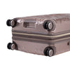 close up of  wheels on metallic topaz rolling check in luggage