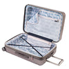 open Indio topaz check-in suitcase with a blue and white fern pattern lining and navy blue compression straps