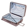 open Indio topaz check-in suitcase with a blue and white fern pattern lining and navy blue compression straps