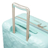 close up of ergonomic handle on Indio mint check in suitcase