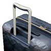 close up of ergonomic handle on Indio navy check in suitcase