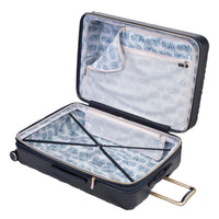 open Indio navy check-in suitcase with a blue and white fern pattern lining and navy blue compression straps