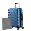 twilight blue Ricardo Mojave carry-on hardside suitcase with diagonal grooves shown with a large grey packing cube