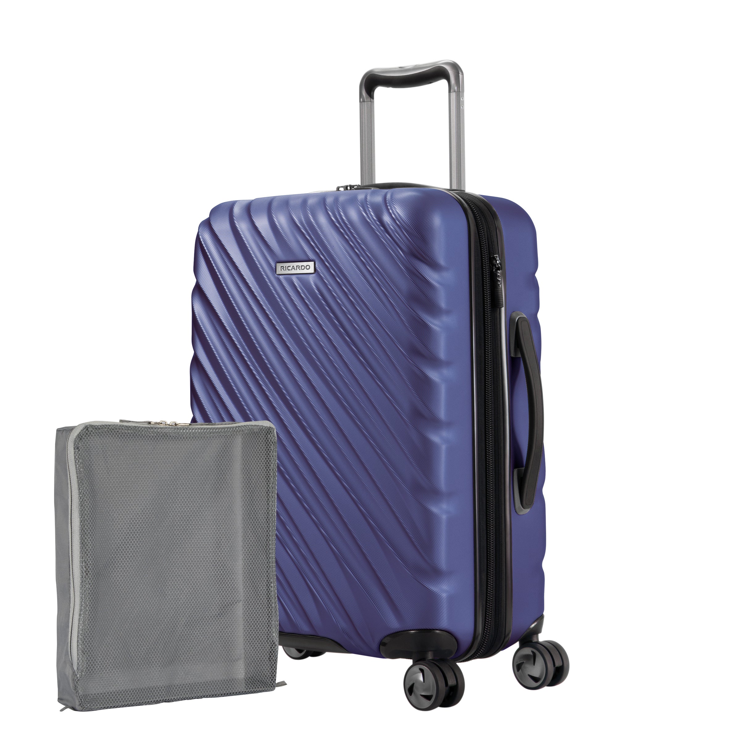 Maritime blue Ricardo Mojave carry-on hardside suitcase with diagonal grooves shown with a large grey packing cube