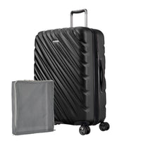 black Ricardo Mojave hardside suitcase with diagonal grooves shown with a large grey packing cube
