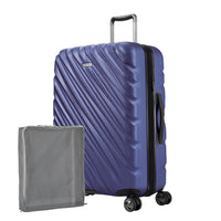 Maritime Blue Ricardo Mojave hardside suitcase with diagonal grooves shown with a large grey packing cube