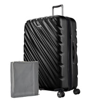 black onyx Ricardo Mojave hardside suitcase with textured diagonal grooves shown with a large grey packing cube