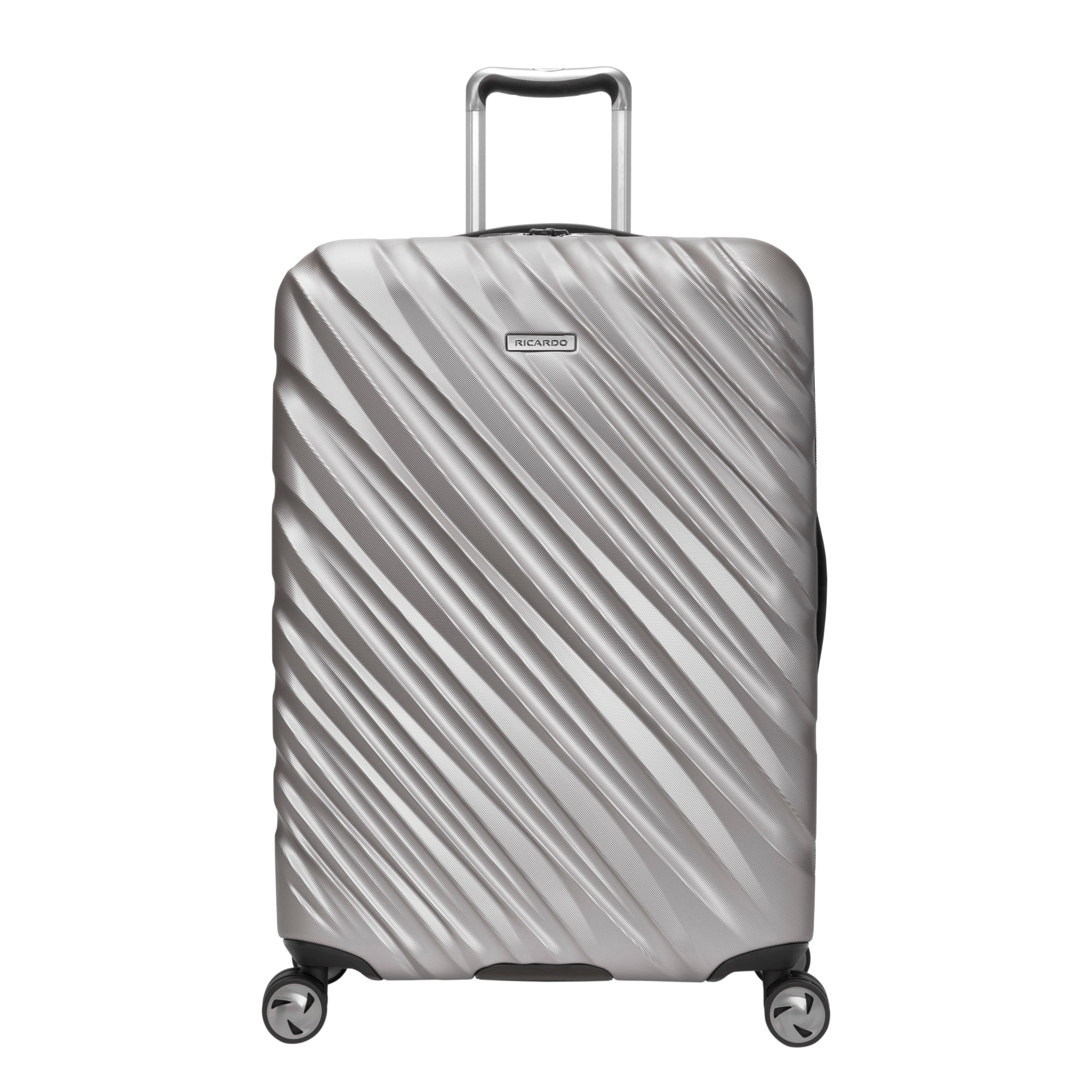Platinum silver Ricardo Mojave suitcase with black wheels, zipper, and handles