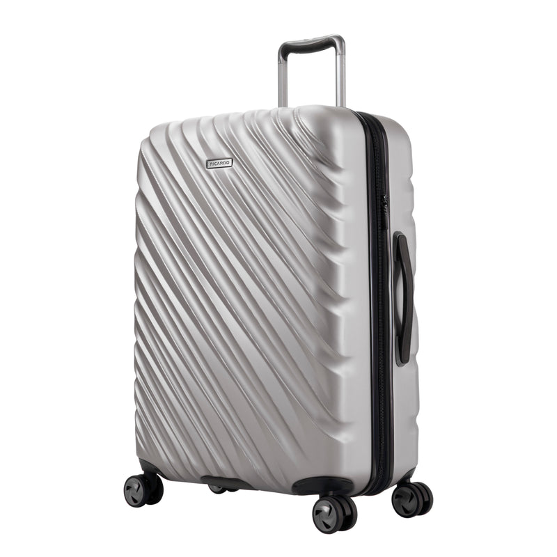 Platinum silver Ricardo Mojave carry-on with black wheels, zipper, and handles